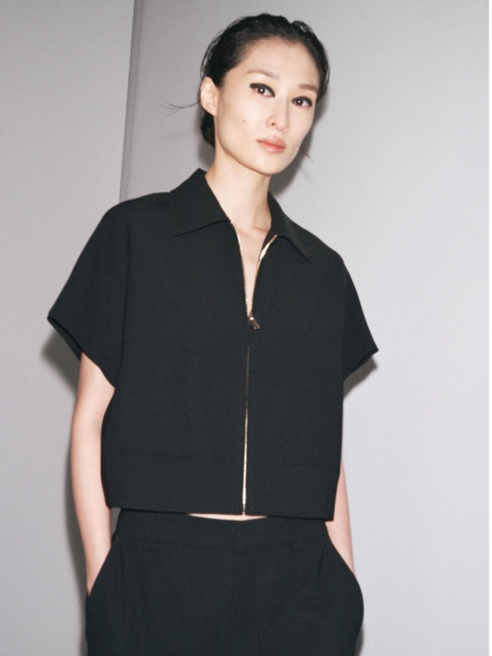 Zara Black Short Sleeve Zip-Front Crop Top Jacket with gold zipper